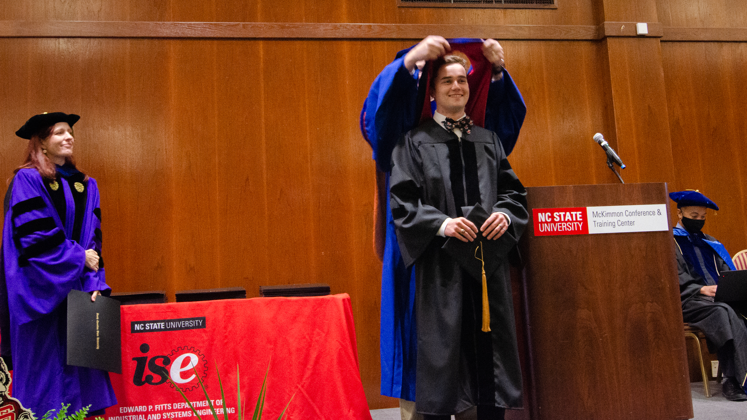 Gregory Hauser being hooded
