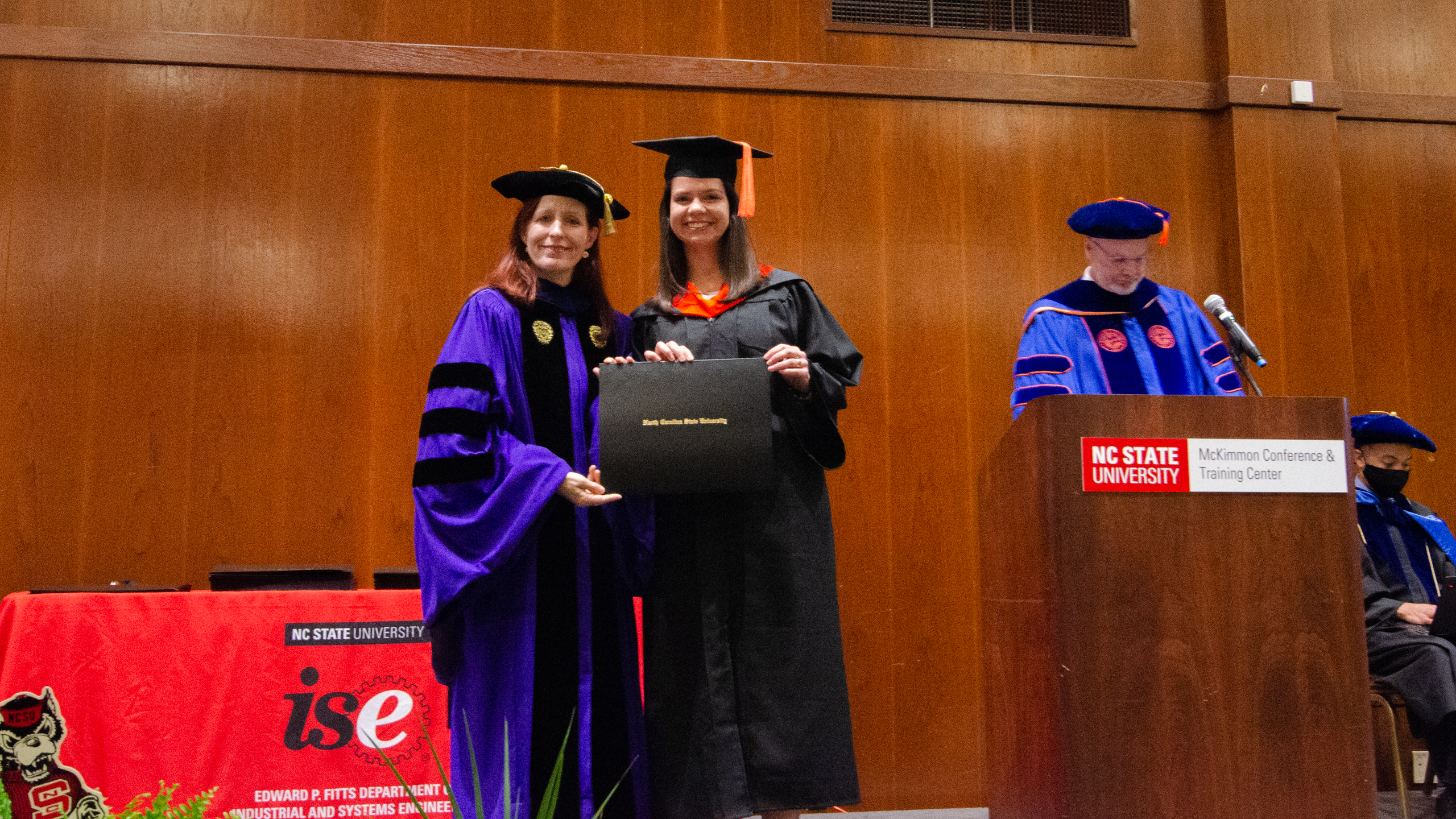 Juliana Pin receiving her diploma