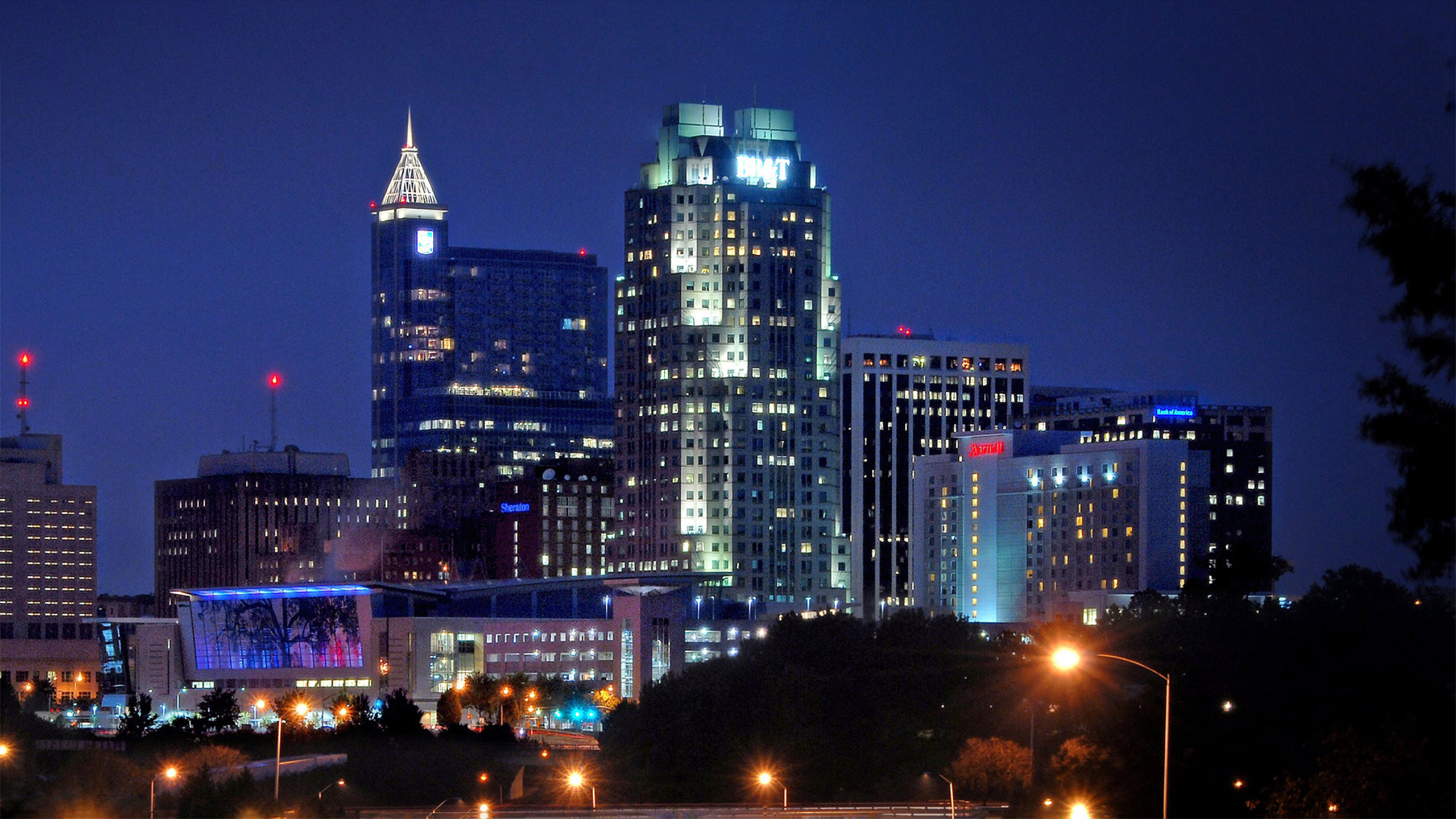 A cityscape of downtown Raleigh at night