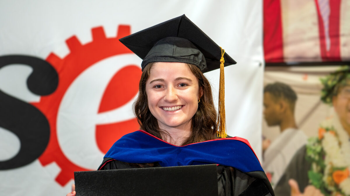 Ph.D. student Demetra Protogyrou  poses with her new degree.