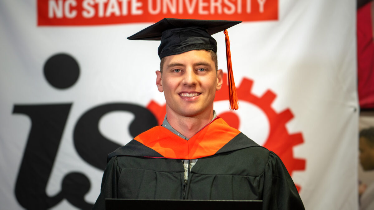 MSOR student Gregory Bremser poses with his new degree.