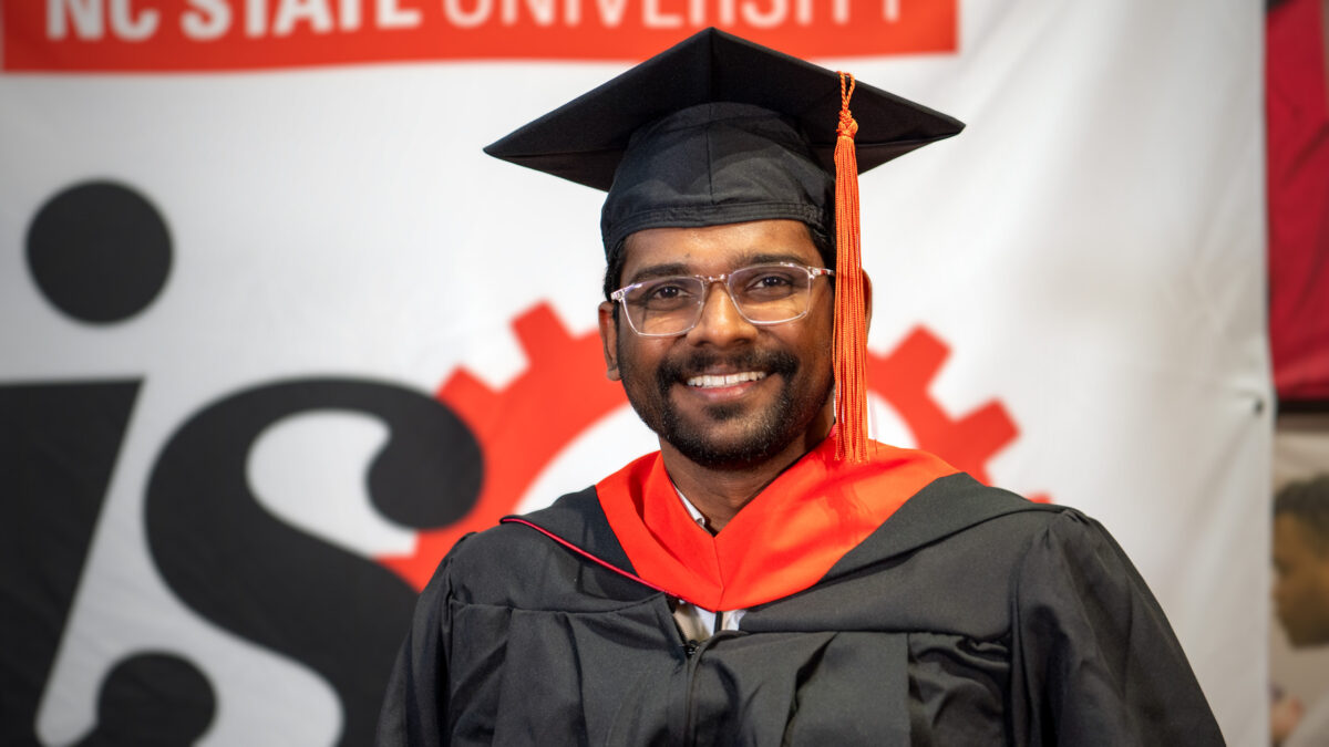 MOR student Harshavardhan Bandaru poses with his new degree.